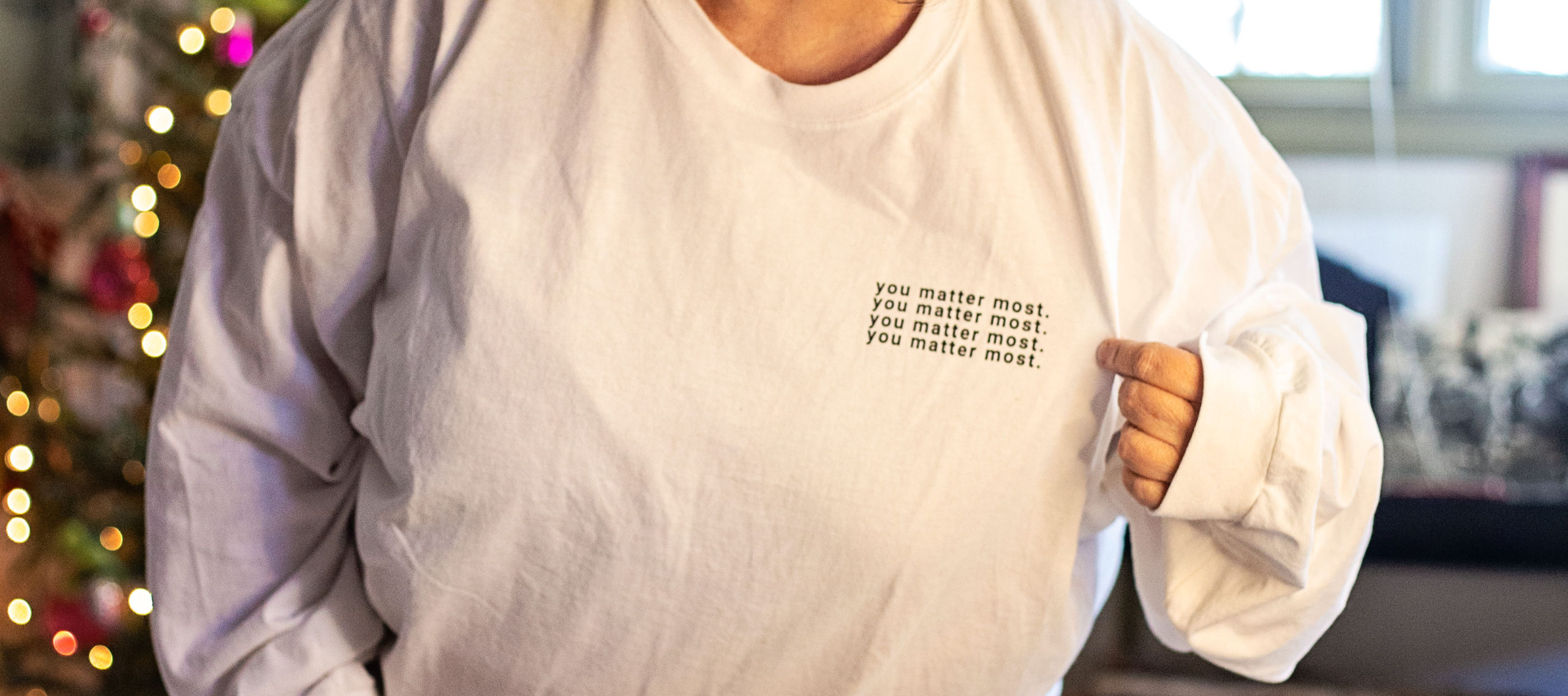 close up of text on healthcare movement tee shirt