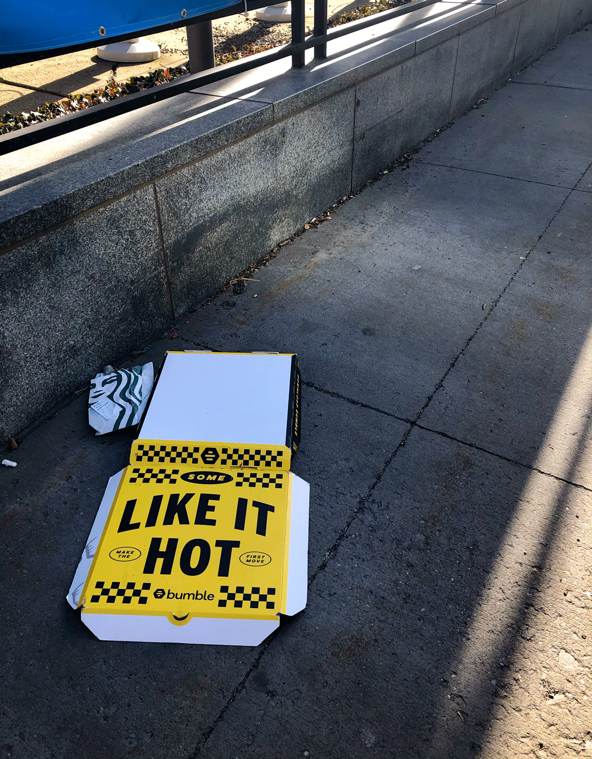 some like it hot pizza box on nyc sidewalk